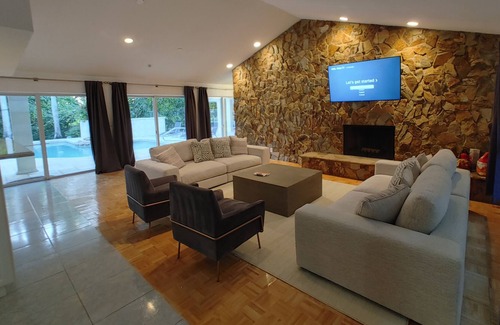 Coral Springs Villa | Private Villa with tennis court, sauna movie theater pool and more