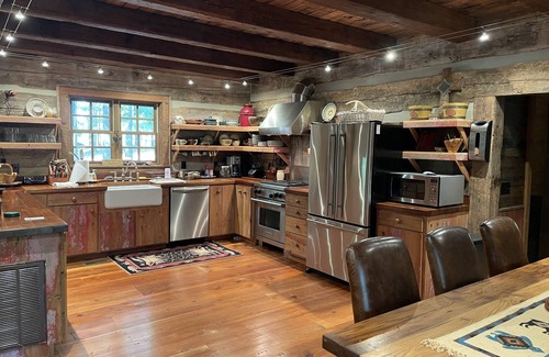 Hanceville Cabin | Prospect Mountain Cabin custom log home sportsman's paradise with fishing lake.