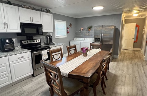 Golden Meadow House | Purple Pelican - Boat Access - Island Realty