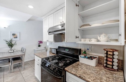 Azusa House | Quaint City Haven: 2-Bedroom Retreat with Free Laundry Access, Private Parking Bliss, and Blazing Internet.