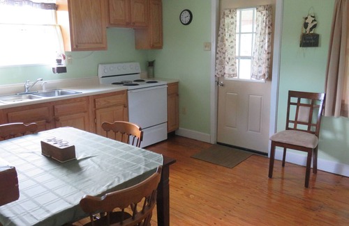 East Bernstadt Cabin | Quaint, Cozy, Comfortable Cabin W/ HotTub, Big Backyard, Pond, Pet Friendly