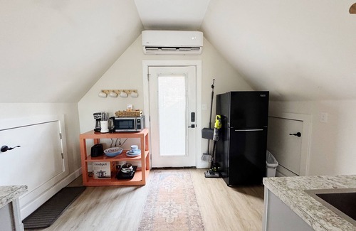 Greenville Apartment | Quaint Garden Cottage ~ 2 miles to Downtown Greenville!