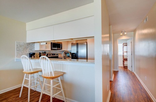 Topsail Beach Condo | Queen's Grant C-109 Oceanfront Condo - Community Pool, Playground, Day Docks