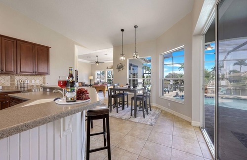 Burnt Store House | Quick Gulf Access Pool/Spa Home with Games Room + Tiki Hut