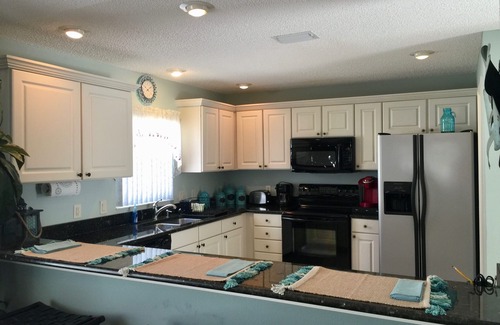 Virginia Trace House | Quick walk to Lake Sumter Landing! Gas Golf Cart Included!
