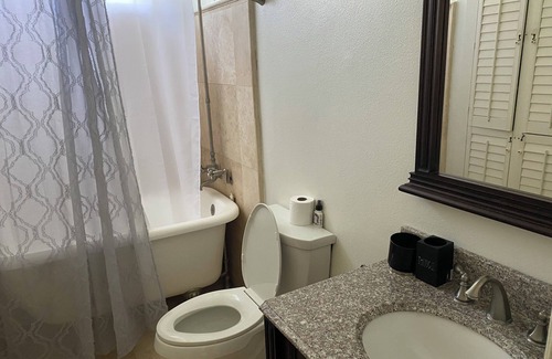 Thousand Oaks House | Quiet bedroom in house with couch and desk Thousand Oaks