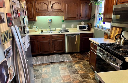 Asheville House | Quiet bungalow in west Asheville with hot tub, fitness room, and a wood stove.