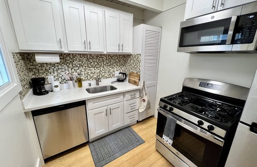 Belmont Apartment | Quiet Garden Escape with Sunset View Walkable to Train, Shops, Belmont Apt. 1/1