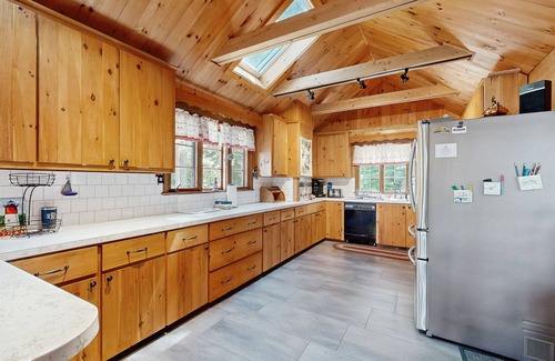 Meredith House | Quintessential lakefront home with woodstove, beach access, dock & washer/dryer