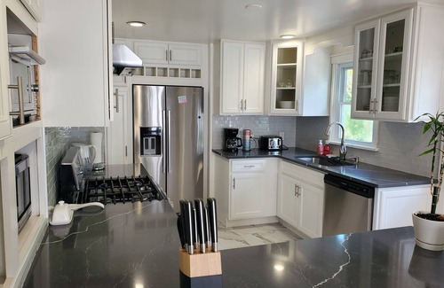 Barnum West House | Quite and spacious house with gulch passing through property & a park backyard