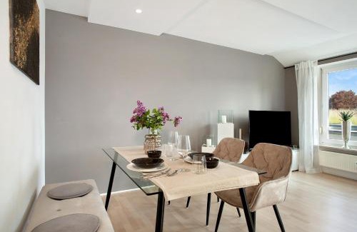 Aschach Apartment | Römerpark Bergblick