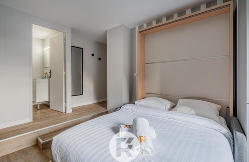 Quartier Exposition-Bajatiere Apartment | R'Apparts Latelier D'exception S2