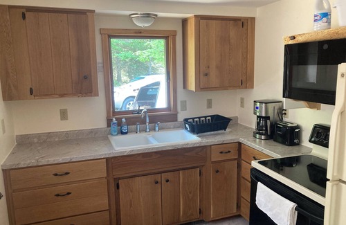 Sturgeon Bay Cottage | R&S Lakeside Cottage Beautiful Large Sand Beach Door County Limestone Fireplace