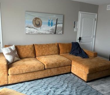 Brigantine House | Radiant Beach Block Condo Parking Patio