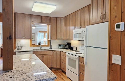 North Litchfield Beach House | Raised Beach Cottage, Screened Porch w/Rockers, 2 TV Dens, Grill, Walk to Beach