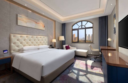 Yicheng District Hotel | Ramada by Wyndham Zhumadian West Station
