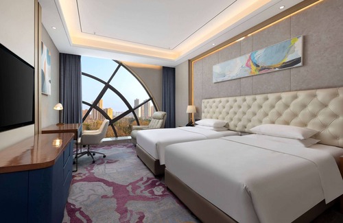 Yicheng District Hotel | Ramada by Wyndham Zhumadian West Station