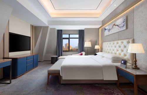 Yicheng District Hotel | Ramada by Wyndham Zhumadian West Station