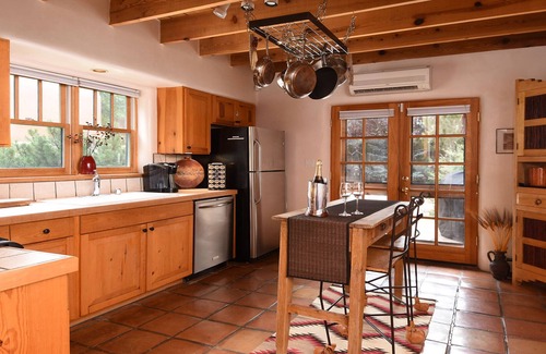 Historic Eastside House | READ OUR REVIEWS! Enchanting art-filled adobe, lush gardens, easy walk to Plaza