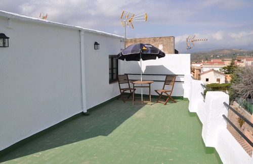 Orgiva House | Recently renovated 2 bed townhouse with a large roof terrace in Orgiva town.