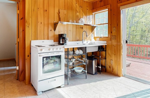 Sandgate Apartment | Red barn retreat with river views, hot tub, deck, firepit, & large yard
