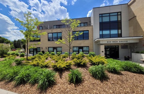Traverse City House | Red Drive at the Elegant Grand Traverse Commons