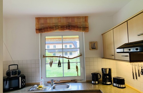 Middelhagen Apartment | Reethaus Boddenblick in Alt Reddevitz with parking lot, ground-level terrace, Wgh12