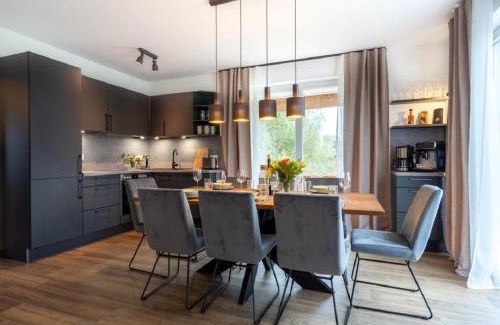 Am Salzhaff House | Reetsnacker - Ferienhaus mit Kamin, Sauna und Whirpool für 8 Personen