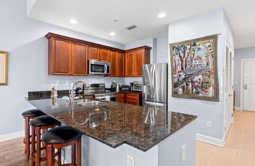Upper Grand Lagoon Condo | Reflections 109 - Bayfront, Beach, Huge Pool - PGA Championship Golf Course