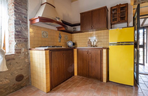 Castiglione della Pescaia Apartment | Reggia, in small medieval village characteristic apartment with fireplace