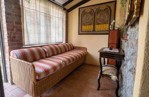 Castiglione della Pescaia Apartment | Reggia, in small medieval village characteristic apartment with fireplace