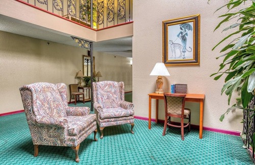 South Tulsa Hotel | Relax and Recharge in a Quiet Room w/King Bed + Handy Mini Fridge Setup
