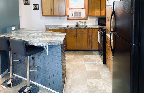 Manistee Apartment | Relax at Redberry House—just blocks from downtown and Lake MI beaches