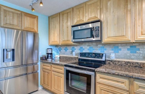 Butler Beach Condo | Relax Beachside in our private neighborhood with all the comforts you need!