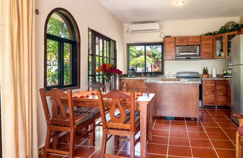 Puerto Morelos House | Relax by the sparkling pool and enjoy the ocean breeze.