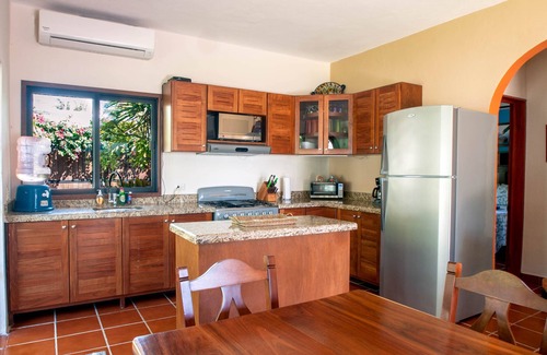 Puerto Morelos House | Relax by the sparkling pool and enjoy the ocean breeze.