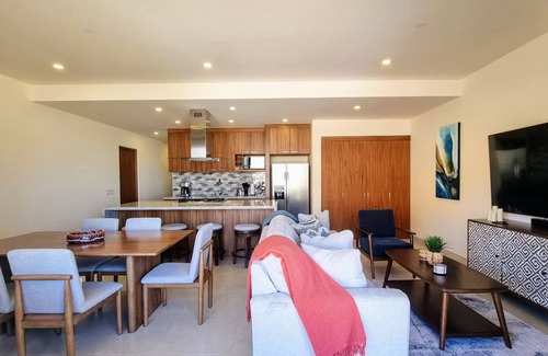 Libertad Apartment | Relax in a Beautiful Condo w/Pool, Gym, Firepit and Partial City and Bay Views