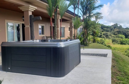 Arenal Villa | Relax in Jacuzzi with panoramic Views of Lake arenal after a day of adventure