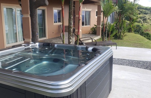 Arenal Villa | Relax in Jacuzzi with panoramic Views of Lake arenal after a day of adventure