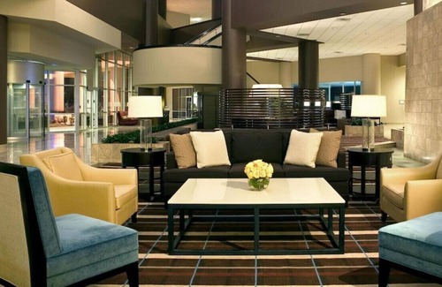 Arlington House | Relax in Style & Comfort! Onsite Dining & Pool