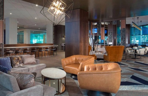 Arlington House | Relax in Style & Comfort! Onsite Dining & Pool