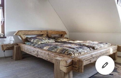 Tettnang Apartment | Relax in the large beamed bed/dream room. Guest room