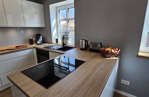 Rysum House | Relax in the newly built vacation home Mühle 7 with sauna, up to 6 pers.