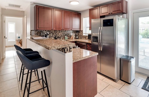 Hunt Club House | Relax & Recharge: Saltwater Pool + Lush Backyard Oasis in Palm Beach Gardens