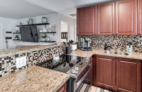 Hunt Club House | Relax & Recharge: Saltwater Pool + Lush Backyard Oasis in Palm Beach Gardens