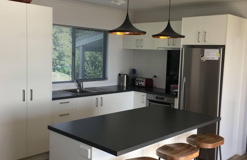 Matauri Bay House | Relax while taking in the expansive sea views