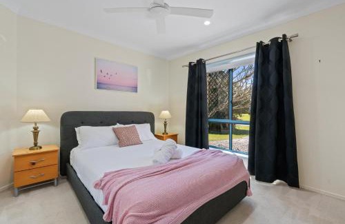 Banksia Beach House | Relaxation & Space in a Canal Home