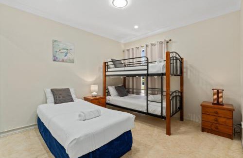 Banksia Beach House | Relaxation & Space in a Canal Home