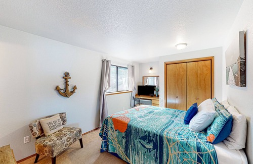Belfair House | Relaxing bay front house with mountain views, lovely deck, wood-stove & firepit