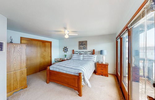 Belfair House | Relaxing bay front house with mountain views, lovely deck, wood-stove & firepit